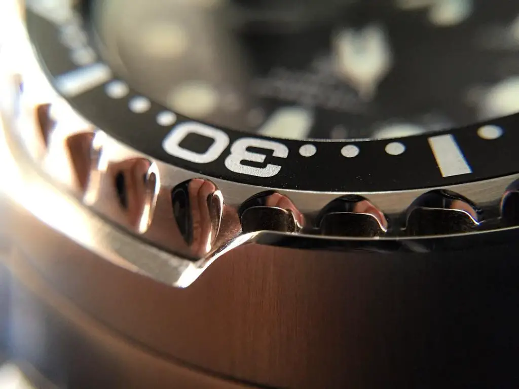Luxury watch bezel with markings